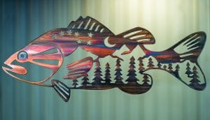 Metal wall art of bass with mountain scene in body. This metal art has a Multi-Color Patina finish.