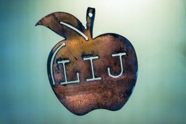 Metal Art shaped apple with L-I-J in middle to represent Ellijay, GA - home of Artful MetalWorx
