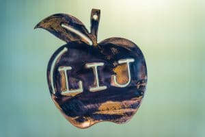 Metal Art shaped apple with L-I-J in middle to represent Ellijay, GA - home of Artful MetalWorx