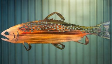 Metal art wall decor of trout with multi-color patina