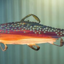 Metal art wall decor of trout with multi-color patina